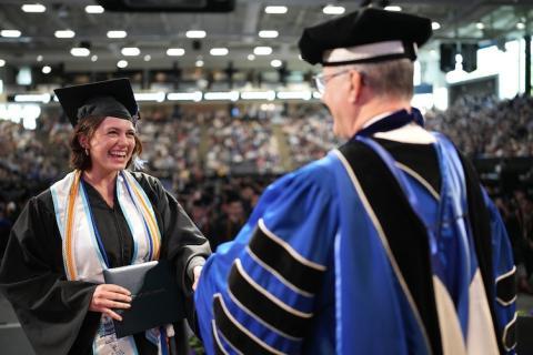 UNH president giving degree at commencement